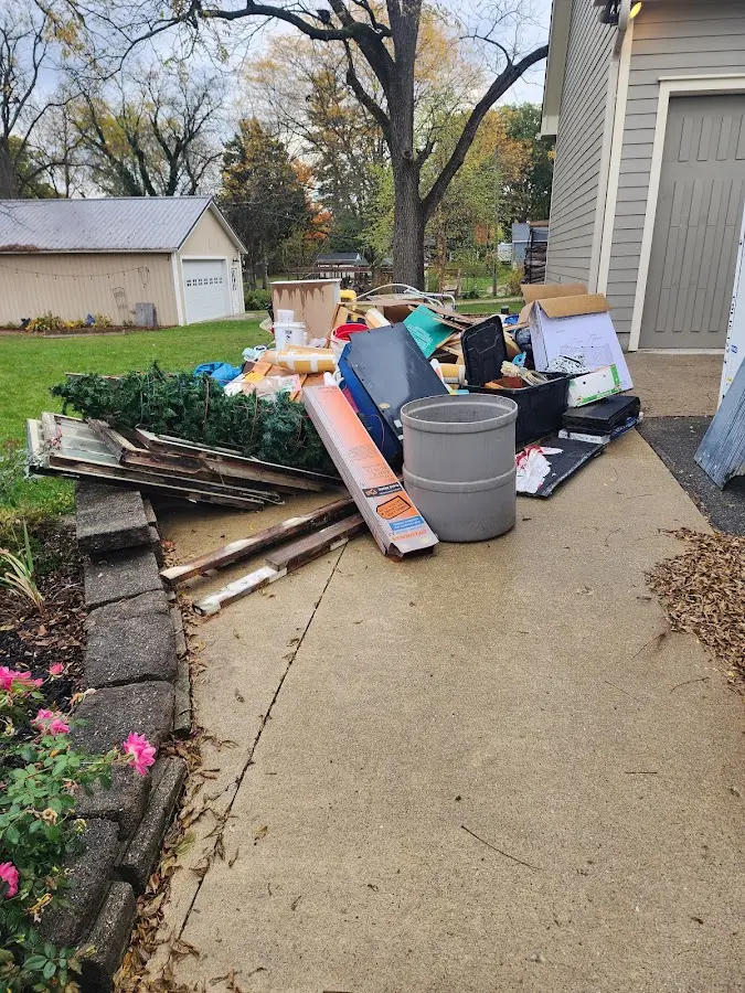 Dumpster being loaded with debris for Demolition Dumpster Rental in Shippensburg